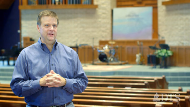 Wayne Smith stands in the church he pastors