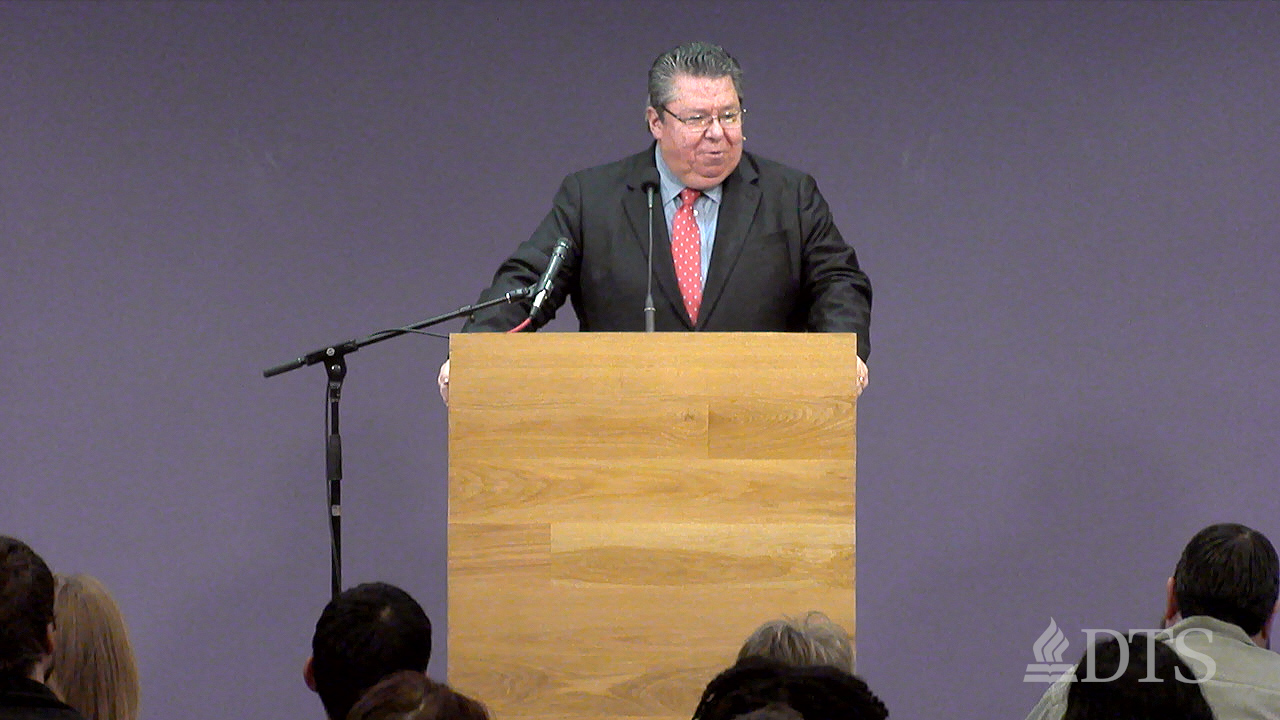 Dr. Mark Bailey standing at podium speaking at DTS Chapel