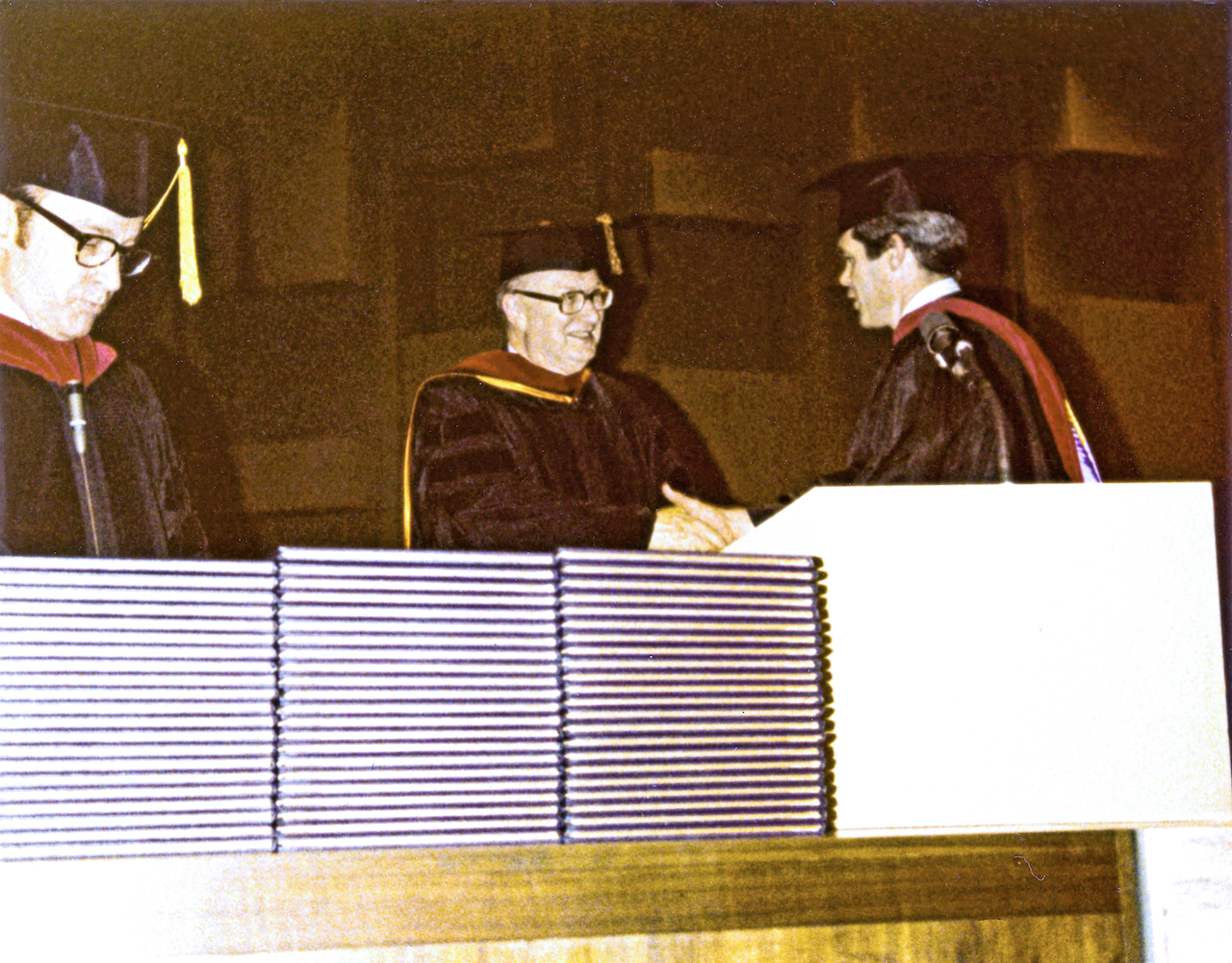 Dr. Malphurs shaking hands while receiving his degree from DTS